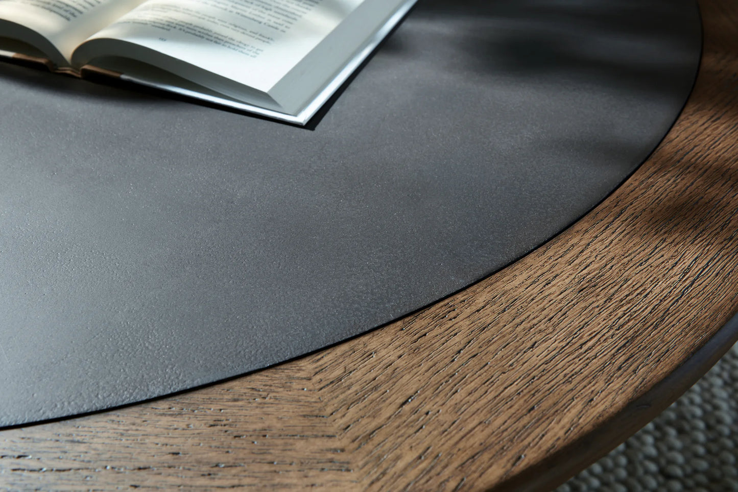 Dontayne - Round Cocktail Table - Warm Brown