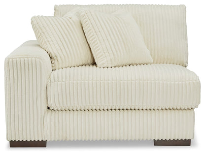 Lindyn - Ivory - 6-Piece Sectional With 3 Armless Chairs