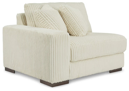Lindyn - Ivory - 6-Piece Sectional With 3 Armless Chairs