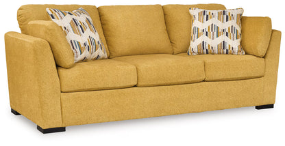 Keerwick - 4 Pc. - Sofa, Loveseat, Chair And A Half, Ottoman - Sunflower