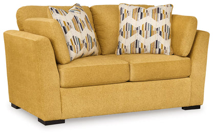 Keerwick - 4 Pc. - Sofa, Loveseat, Chair And A Half, Ottoman - Sunflower