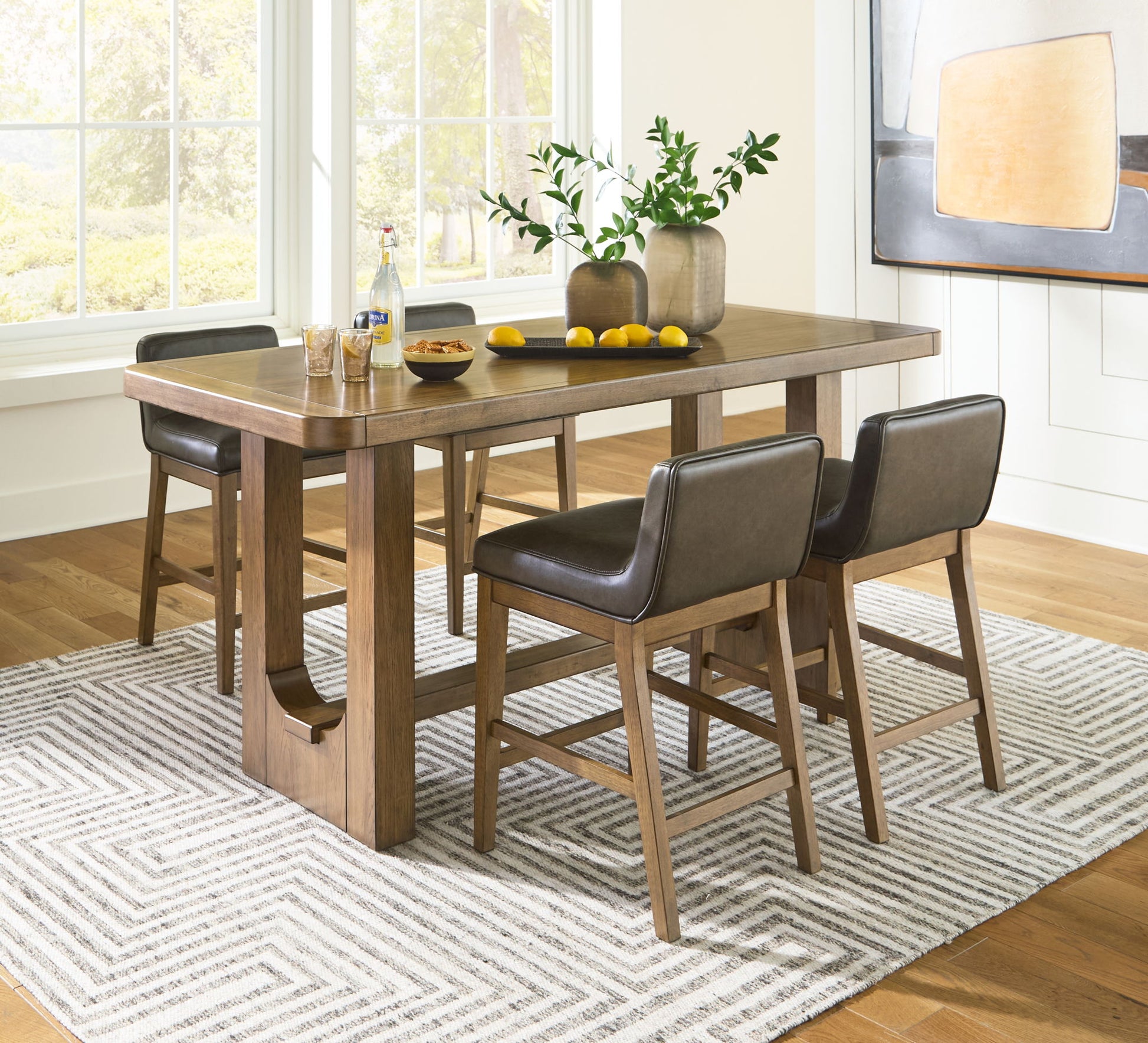 Cabalynn - Light Brown - 5 Pc. - Rectangular Dining Room Counter Table, 4 Upholstered Barstools