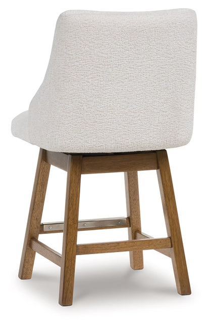 Cabalynn - Oatmeal / Light Brown - Upholstered Swivel Barstool (Set of 2)