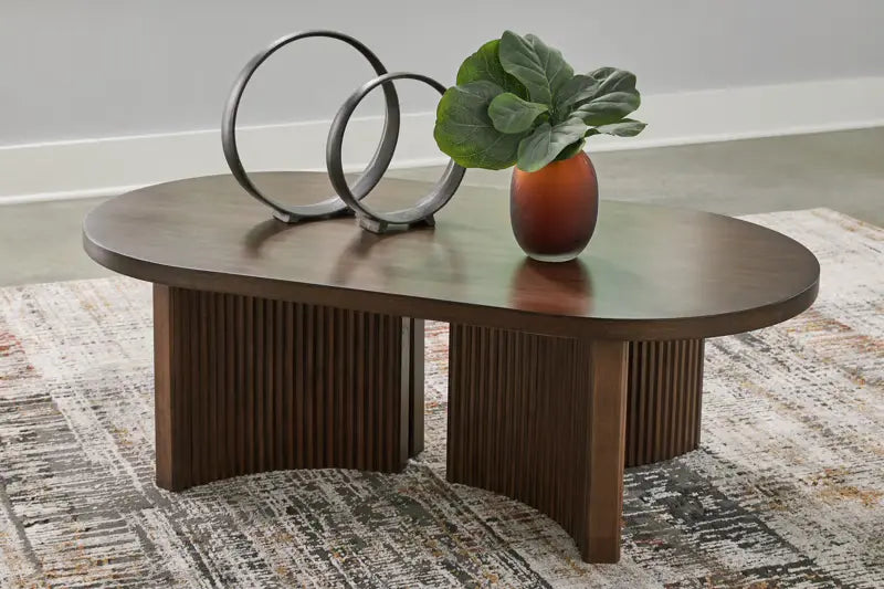 Korestone - Dark Brown - Oval Cocktail Table 1