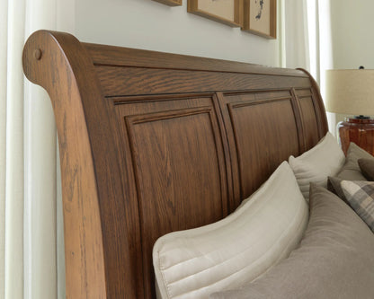 Zackaryn - Queen Sleigh Storage Bed - Warm Brown
