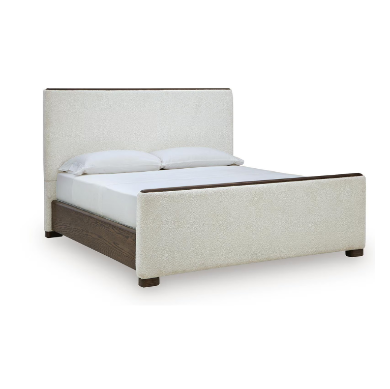 Radkin - Queen Upholstered Panel Bed - Burnished Brown