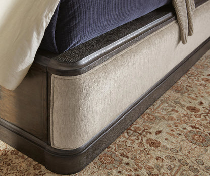 Wickenger - Queen Upholstered Panel Bed - Dark Brown