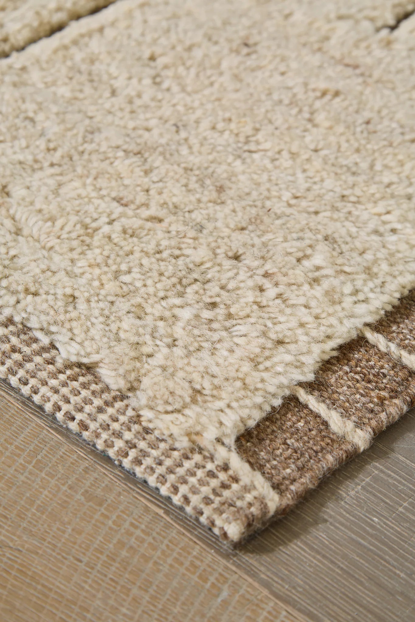 Clayman - 5' x 7' Rug - Beige / Brown