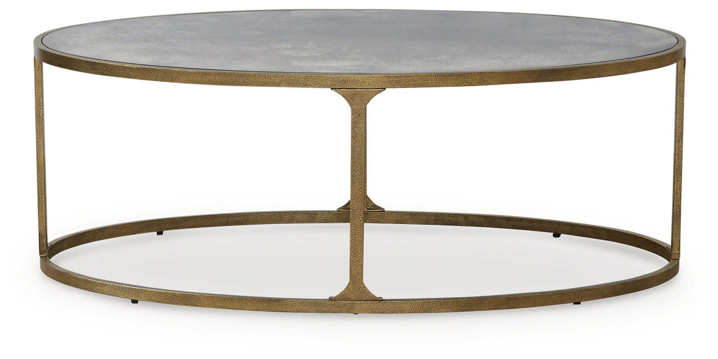 Korajane - Antique Gold - Oval Cocktail Table