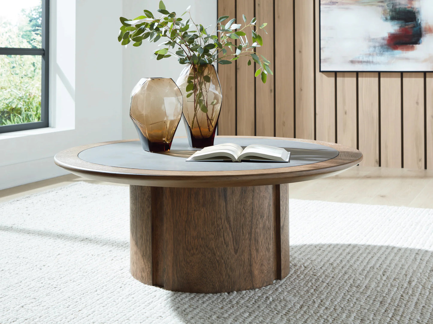 Dontayne - Round Cocktail Table - Warm Brown