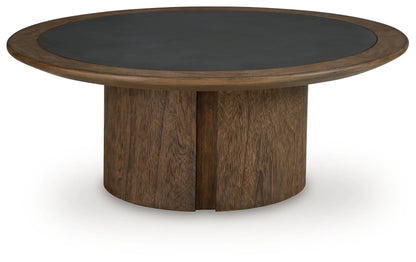 Dontayne - Round Cocktail Table - Warm Brown