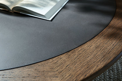 Dontayne - Round Cocktail Table - Warm Brown