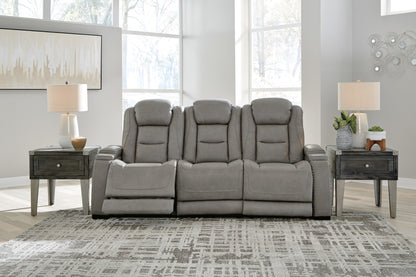 The Man-den - Gray - Pwr Rec Sofa With Adj Headrest